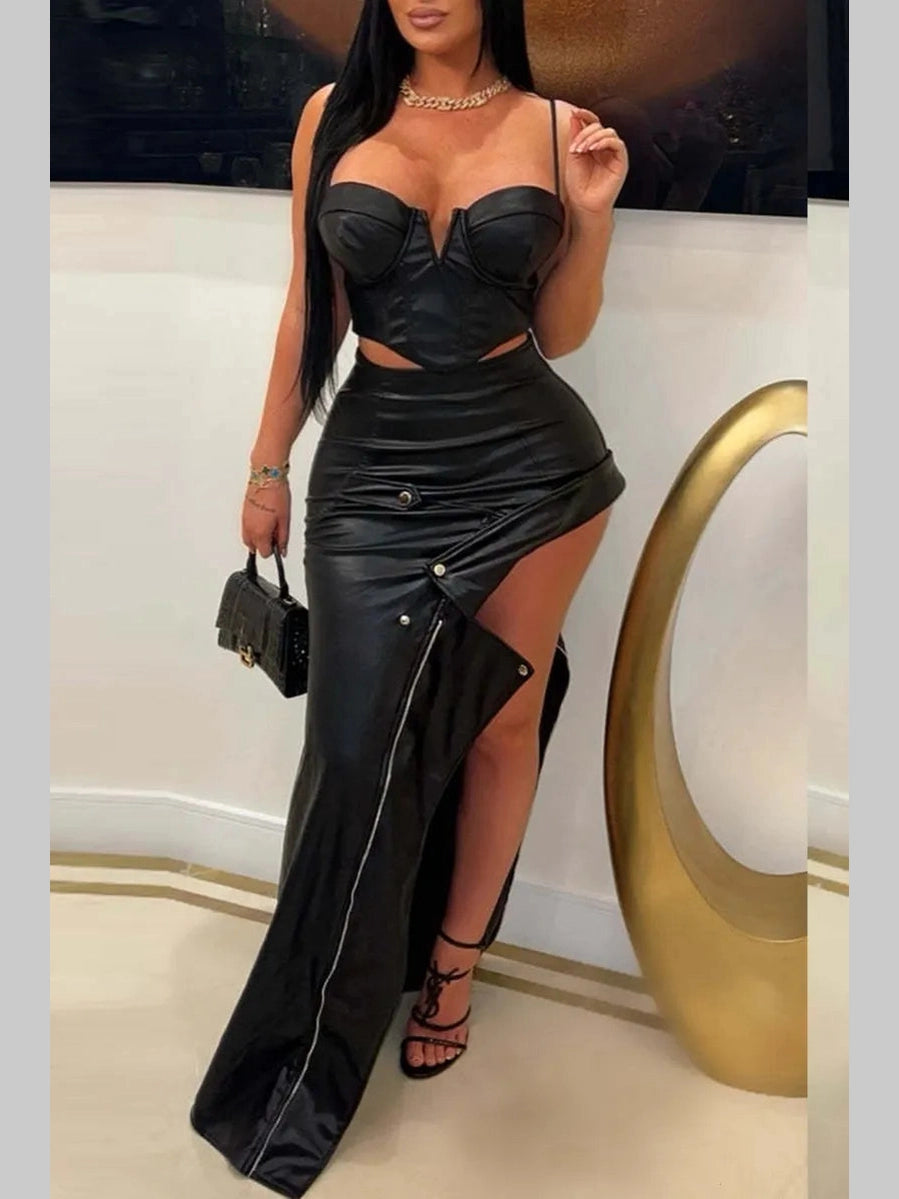 Women's black Dangerously Chick faux leather maxi skirt with an asymmetrical design and dramatic thigh-high slit.