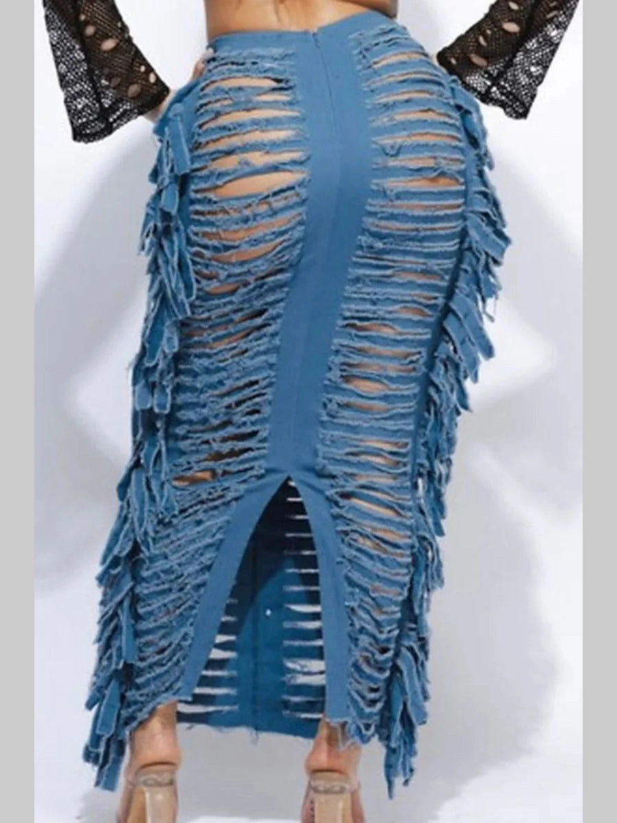 Back view of a high-waisted denim maxi skirt with distressed fringe detailing.