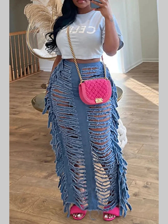 Women's Unraveled Denim Maxi Skirt with dramatic distressed detailing and cascading frayed fringe.